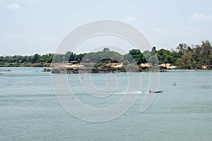 Boat on the River Southern of Laos Southeat Asia photo