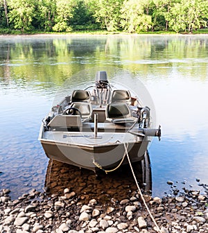 A boat moored on the Allegheny River in Warren County, Pennsylvania, USA