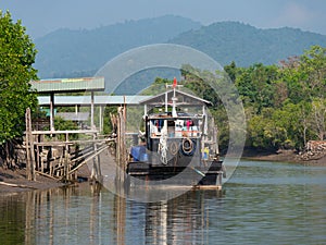 Boat on canal at Kadan Kyun, Myanmar photo