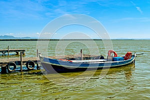 Boat moored in a dock in the Albufera, in Valencia, Spain