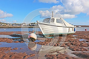 Boat on the River Teign at low tide