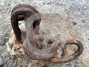 Boat mooring chain. Rusty metal chain links. Place for attaching boats