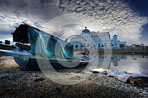 A boat and a mosque