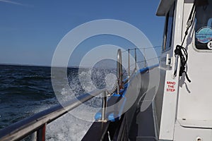 Boat motoring through the sea