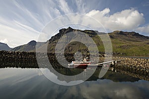 Boat,mountain, reflection in Iceland