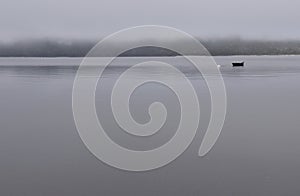 Boat on the mystic fog