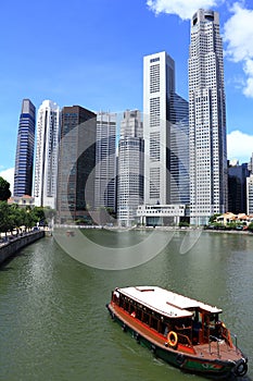 Boat is navigating singapore river