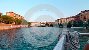 boat on naviglio darsena in milan italy in sunny day