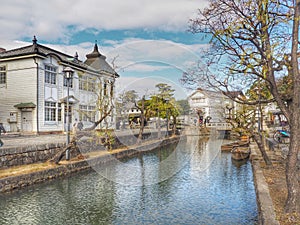 Boat in old canal of Kurashiki, Okayama, Japan