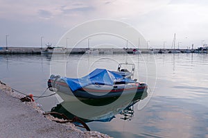 Boat at the old pier in Nea Kallikratia, Greece