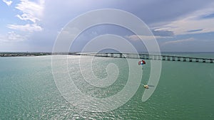 Boat and parasail on the bay