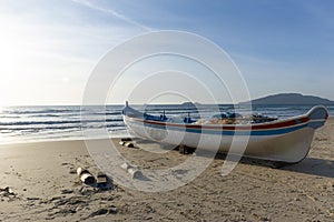 Boat parked at the Ingleses beach in Florianopolis, Brazil during the sunrise