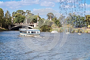 Boat with people in River Torrens