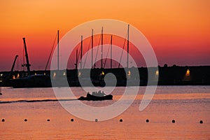 Boat with people in the small port of Marciana, Elba Island