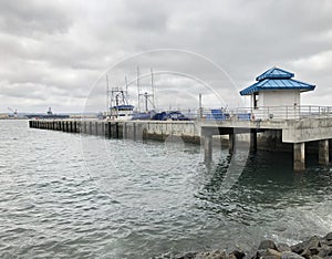 Boat pier in bay by San Diego