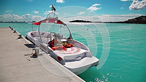 Boat at the pier of Caribbean island of San Martin waiting for tourists