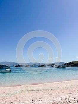 Boat at Pink Beach photo