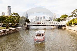 Boat Approaching Anderson Bridge on Singapore River