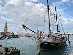 Boat at the Punta della Dogana along the Giudecca canal and Gran Canal in Venice, Italy