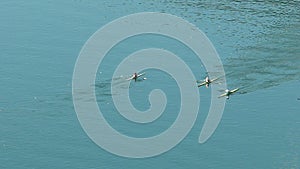 Boat racing competition, athletes rowing boats and trying to win the race