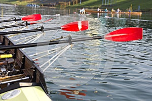 Boat with a red paddle