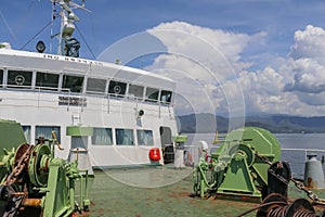 Boat reels with forecastle in background on a ferry in Indonesia. Electrically powered mechanisms for lowering the anchor.