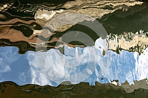 Boat reflected in the water, Venice