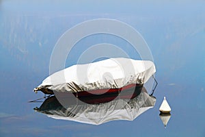 Boat with reflection photo