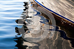 Boat Reflection on the Sea Water