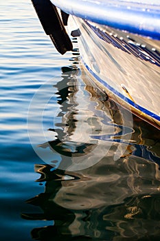 Boat Reflection on the Sea Water