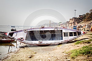 boat repair (boat inverted for drying, caulking and painting