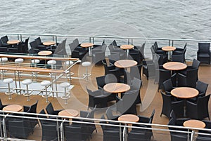 Boat restaurant tables and chairs on deck