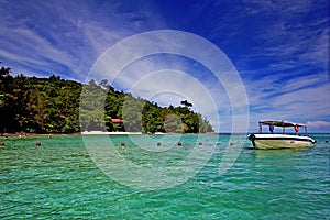 Boat ride to tropical island photo