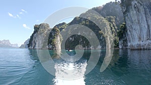 Boat ride , tropical Thai jungle lake Cheo lan, wooden mountains nature, national park ship yacht rocks