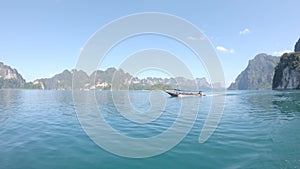 Boat ride , tropical Thai jungle lake Cheo lan, wooden mountains nature, national park ship yacht rocks