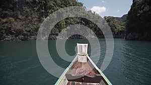 Boat ride , tropical Thai jungle lake Cheo lan, woodrn mountains nature, national park ship yacht rocks