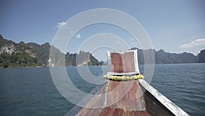 Boat ride , tropical Thai jungle lake Cheo lan, woodrn mountains nature, national park ship yacht rocks