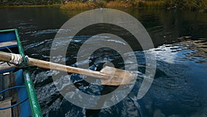 Boat rides on Lake Huallhua located in Huancaya south of Lima - Peru. A palette is visible up close. photo