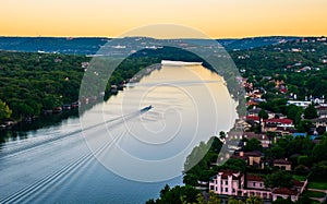 Boat riding across the water Austin Texas Colorado river bend