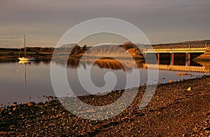 Boat in the river Mite during the sunset at Ravenglass estuary in Cumbria