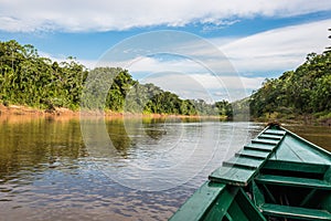 boat in the river in the peruvian Amazon jungle at Madre de Dios Peru photo