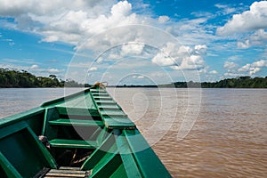 boat in the river in the peruvian Amazon jungle at Madre de Dios Peru