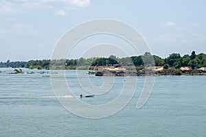 Boat on the River Southern of Laos Southeat Asia photo