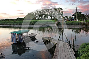 Boat and river in sunset