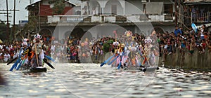 Boat rowing competition- rowers in ethnic wear- heikru hidongba in Manipur India