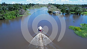 Boat sailing at Amazon River at Amazon Rainforest. Manaus Brazil.