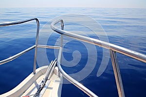 Boat sailing blue calm ocean sea bow railing