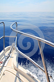 Boat sailing blue calm ocean sea bow railing