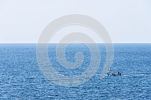 Boat sailing in the Mediterranean Sea in Catalonia, Spain