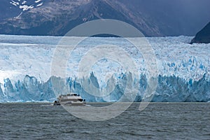 Boat sailing near the Perito Moreno glacier, in Patagonia, Argentina.